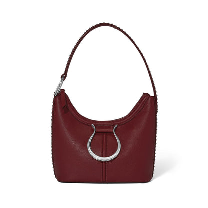 Brighton hobo handbag in burgundy pebbled leather with silver-tone ring accent and studded trim on a white background