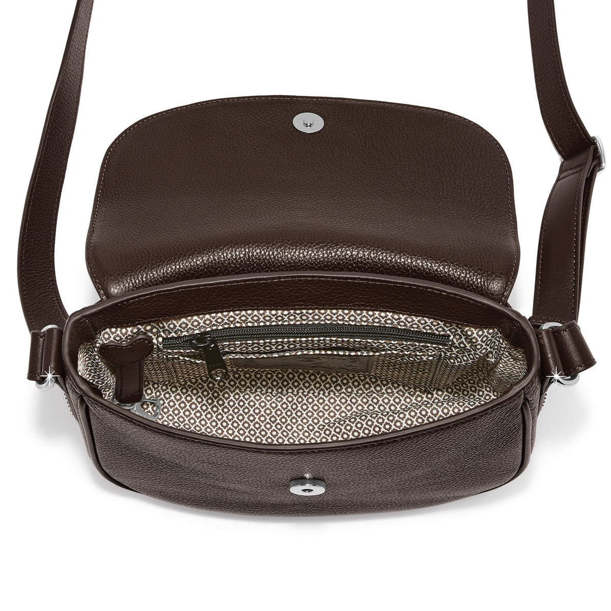Brighton brown leather crossbody handbag shown open with patterned interior lining and zip pocket on a white background