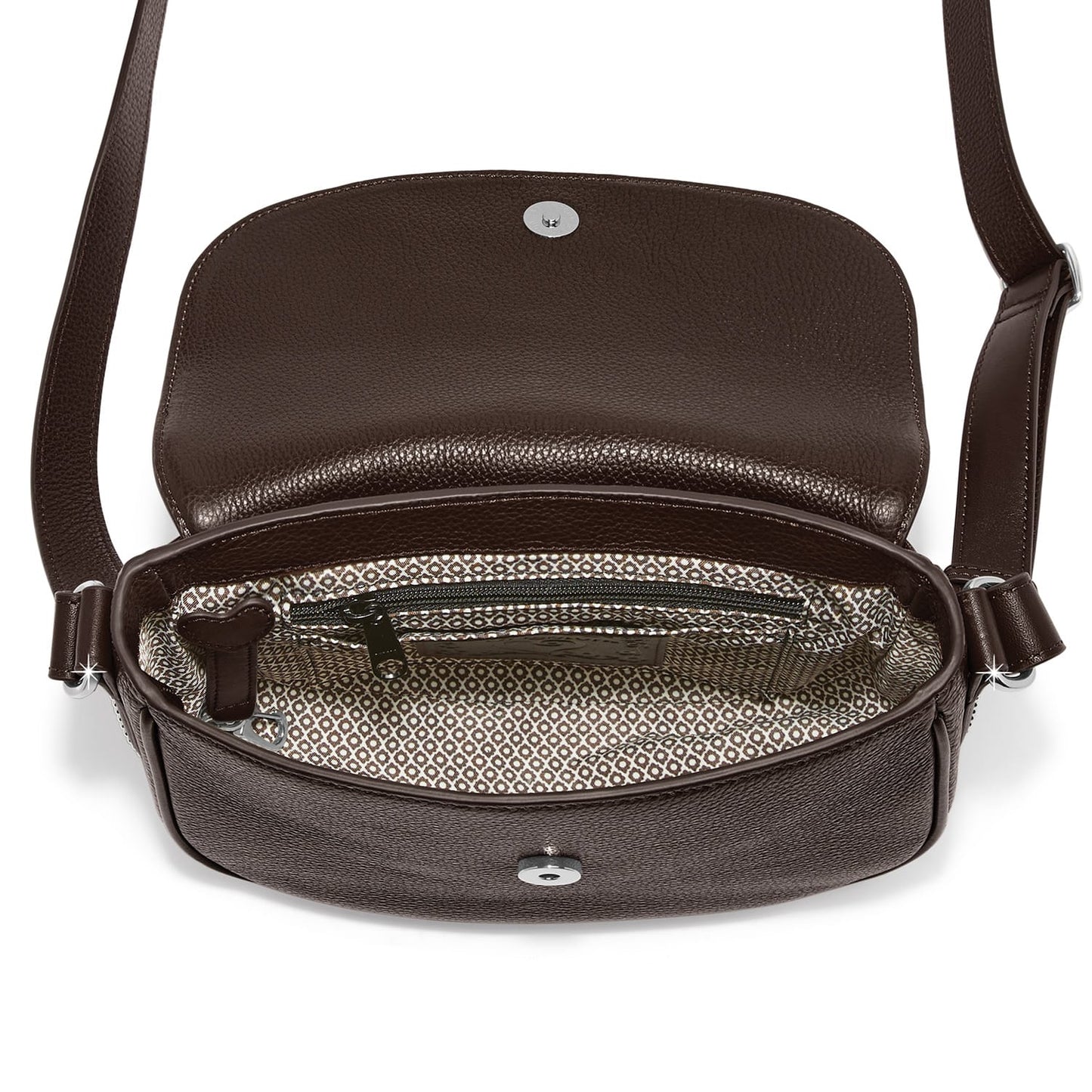 Brighton brown leather crossbody handbag shown open with patterned interior lining and zip pocket on a white background