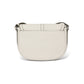 Brighton crossbody handbag shown from the back in cream leather with studded side trim on a white background