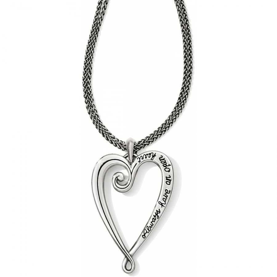 Brighton pendant necklace with silver-plated open heart design and engraved script on braided chain on a white background
