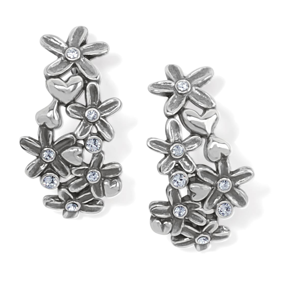 Brighton hoop earrings with silver-plated flowers, hearts, and crystal accents on a white background
