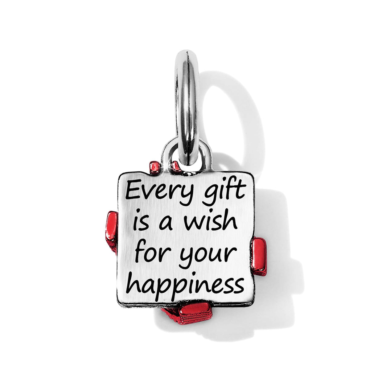 Brighton silver-plated square charm engraved with happiness message and red enamel gift bow accents on a white background
