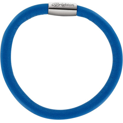 Brighton bracelet in blue leather with silver-plated magnetic clasp featuring engraved logo on a white background