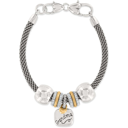 Brighton charm bracelet with silver-plated mesh chain, hammered beads, gold-plated accents, crystals, and Grandma charm on a white background