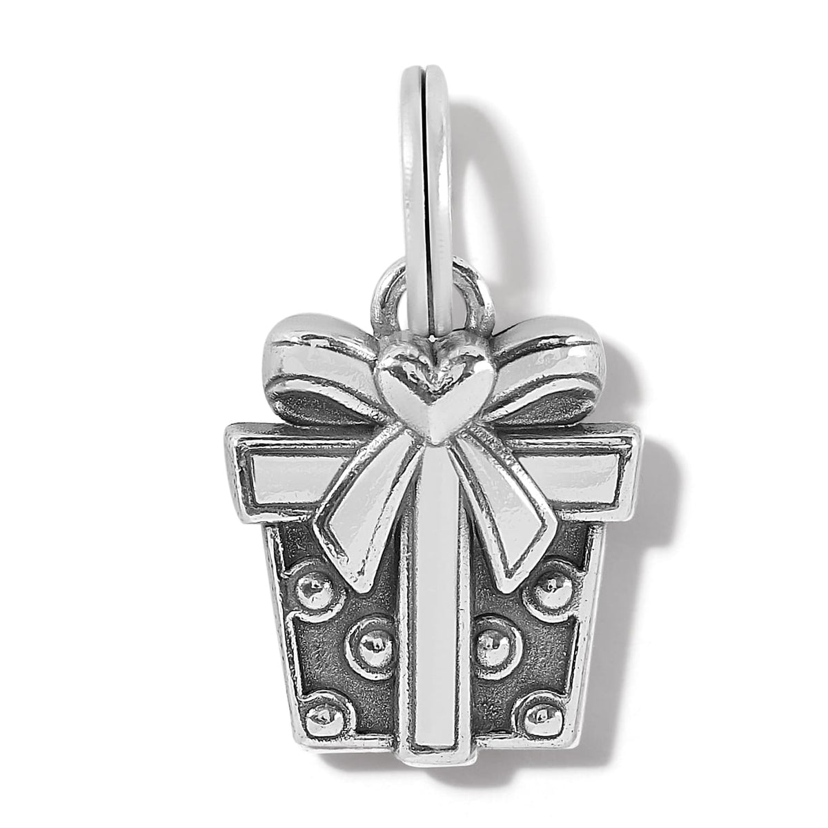 Brighton gift box charm with silver-plated bow, heart accent, and dotted enamel detailing on a white background