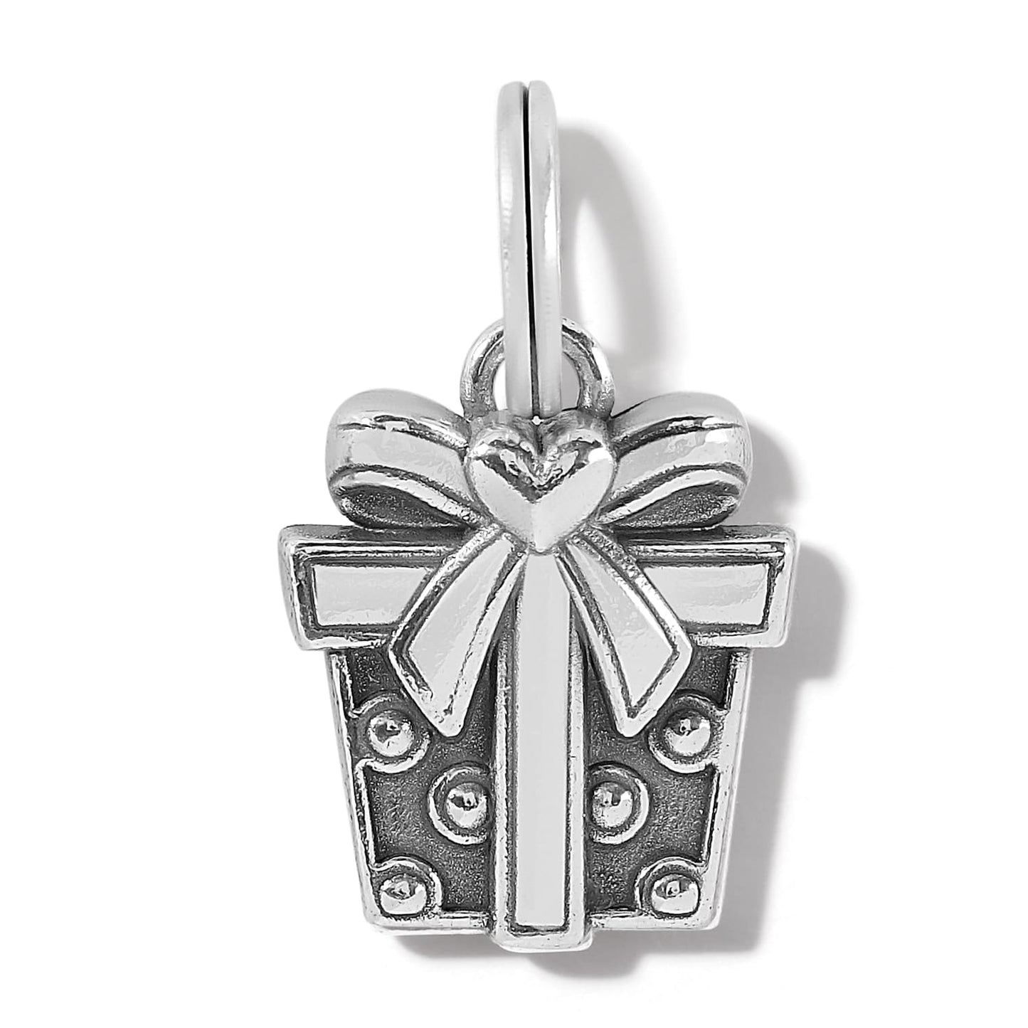 Brighton gift box charm with silver-plated bow, heart accent, and dotted enamel detailing on a white background