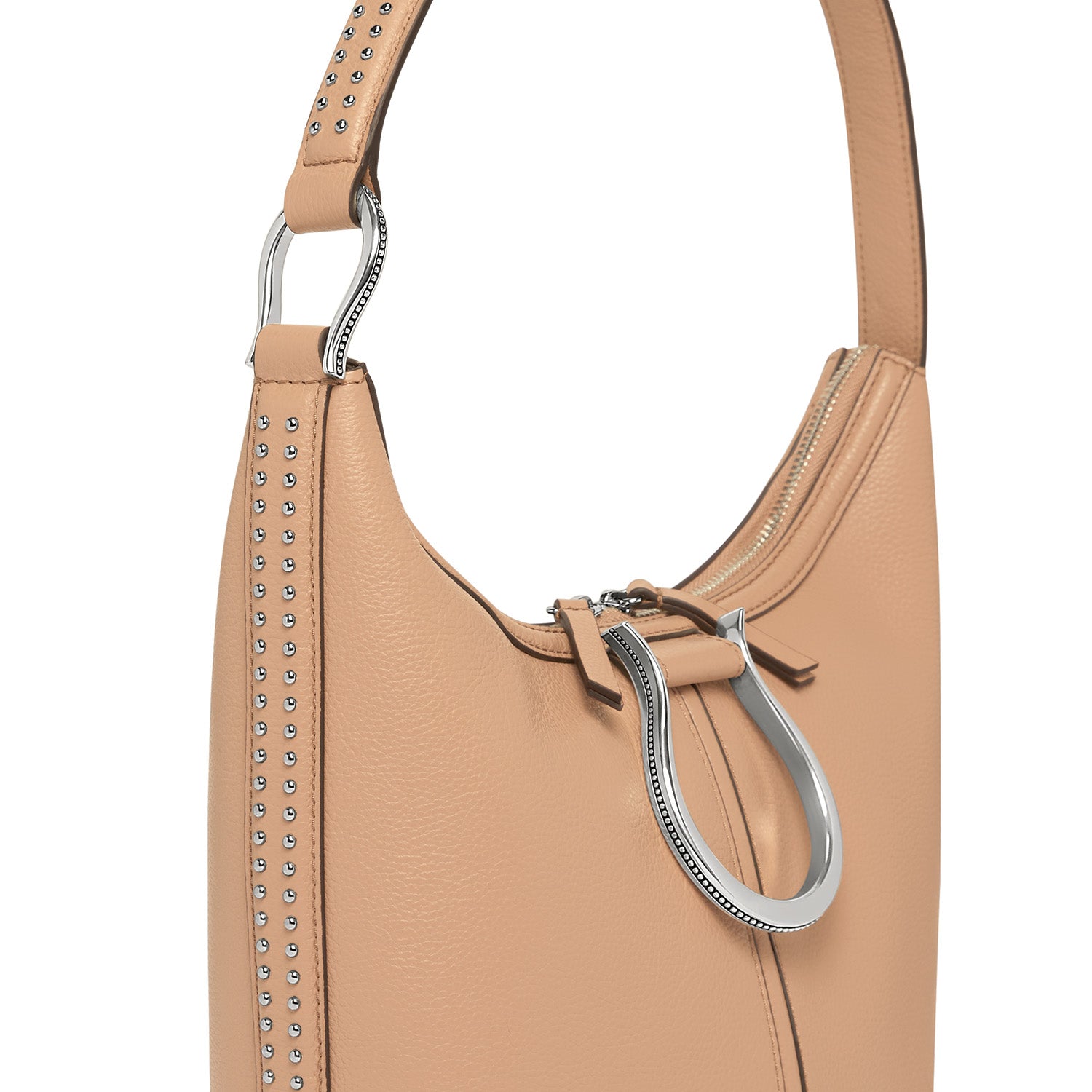Close-up of Brighton tan leather handbag with studded trim, silver-tone horseshoe hardware, and zip closure