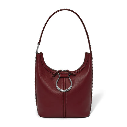 Brighton burgundy leather shoulder handbag with silver-tone ring hardware and beaded trim along edges on a white background