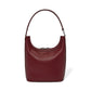 Brighton burgundy leather shoulder handbag with pebbled texture, beaded trim, and curved top handle on a white background