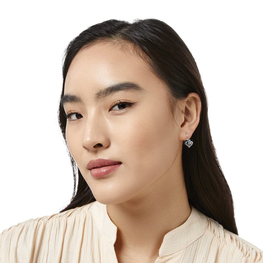 Side view of model wearing Alcazar Heart Leverback Earrings
