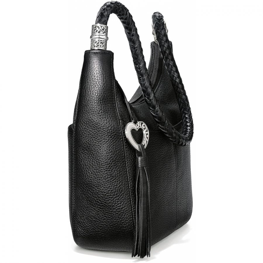 Black leather Barbados Ziptop Hobo handbag with braided handles, silver decorative ends, and a heart-shaped silver pendant with a leather tassel, set against a plain, white background.