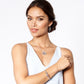 Model wearing Halo Necklace with bracelet & earrings