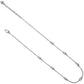 A silver necklace the Illumina Petite Collar Necklace has a delicate chain and symmetrically placed decorative elements, displayed against a plain background.