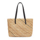 Rear view of Kennis Straw Tote, featuring the detailed straw weave and black handles