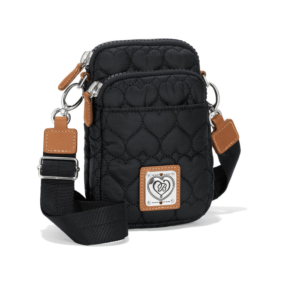 Kora Mini Utility Bag - front view showcasing the compact black design with silver accents and heart stitching