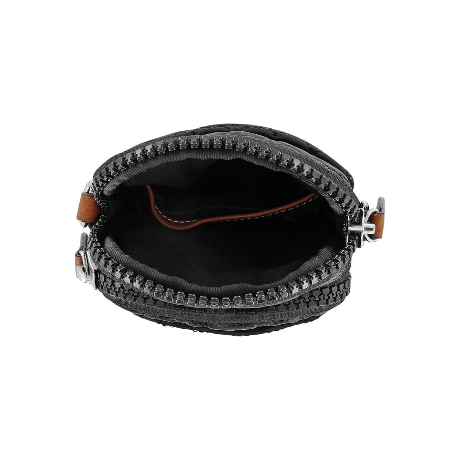 Inside view of Kora Mini Utility Bag in black, showing the organized compartments and lining