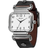 Montecito Reversible Watch with a square silver case and white dial rests against a brown leather strap. Numeral hour markers and the name 