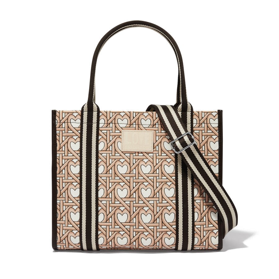 Woven Hearts Canvas Carry All - front view showcasing the heart-patterned canvas design with accents and handles